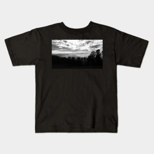 Black and white photography of clouds in a valley Kids T-Shirt